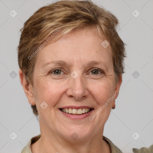 Joyful white adult female with short  brown hair and grey eyes