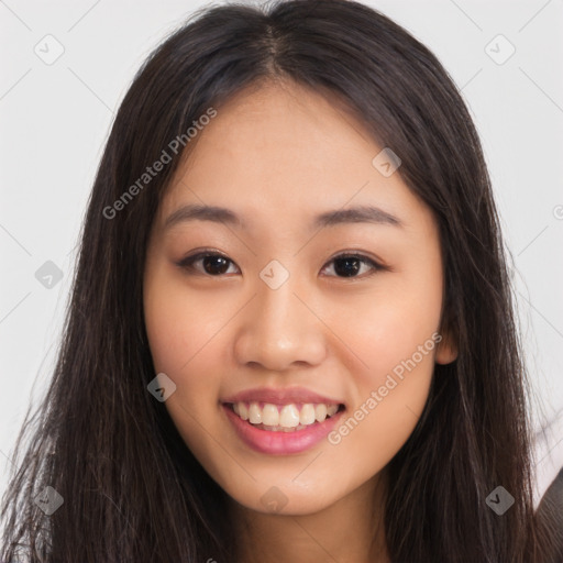 Joyful asian young-adult female with long  brown hair and brown eyes