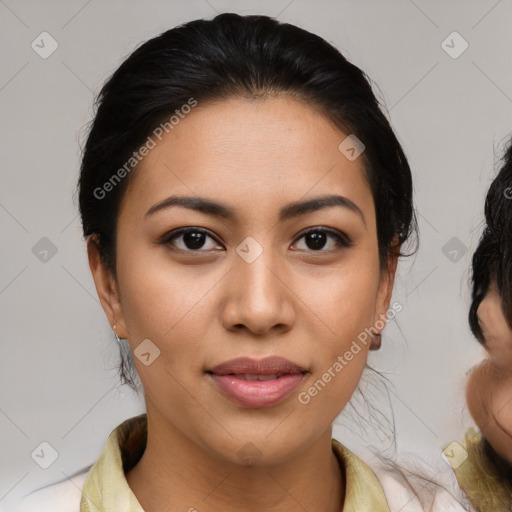 Joyful latino young-adult female with medium  brown hair and brown eyes