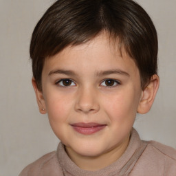 Joyful white child female with short  brown hair and brown eyes