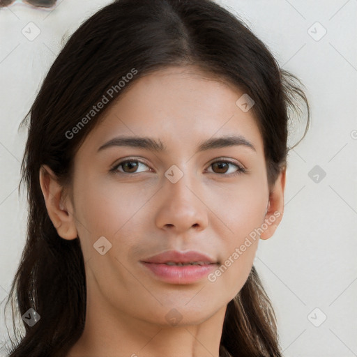 Neutral white young-adult female with long  brown hair and brown eyes