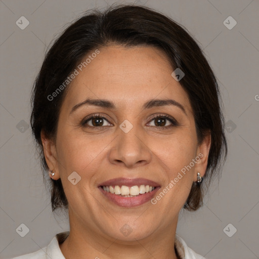 Joyful white adult female with medium  brown hair and brown eyes