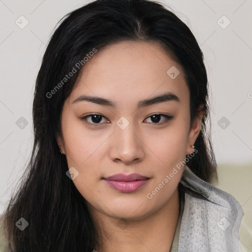 Joyful asian young-adult female with long  black hair and brown eyes