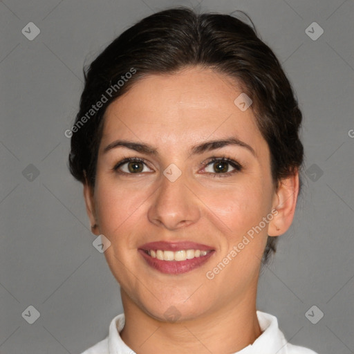 Joyful white adult female with short  brown hair and brown eyes