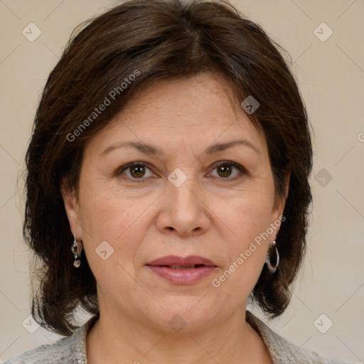 Joyful white adult female with medium  brown hair and brown eyes