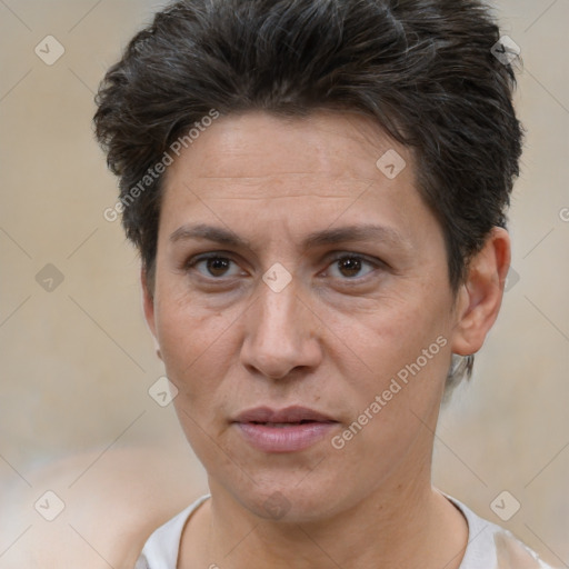 Joyful white adult female with short  brown hair and brown eyes