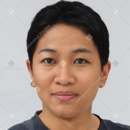 Joyful asian young-adult female with short  black hair and brown eyes