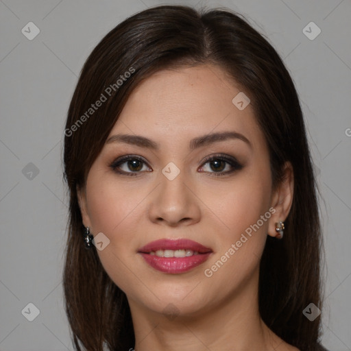 Joyful latino young-adult female with medium  brown hair and brown eyes