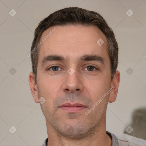 Neutral white adult male with short  brown hair and brown eyes