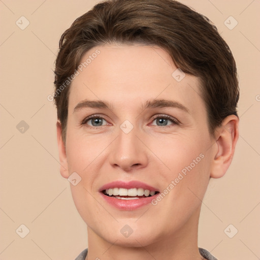 Joyful white young-adult female with short  brown hair and brown eyes