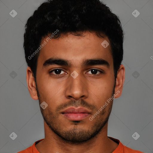 Neutral latino young-adult male with short  brown hair and brown eyes