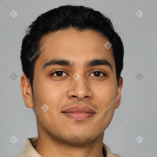 Joyful latino young-adult male with short  black hair and brown eyes