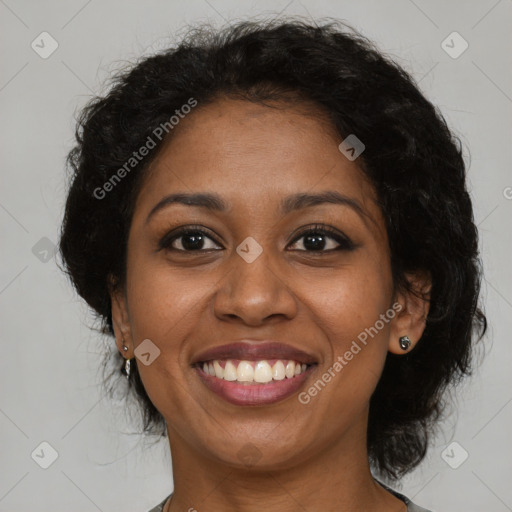 Joyful black young-adult female with medium  brown hair and brown eyes