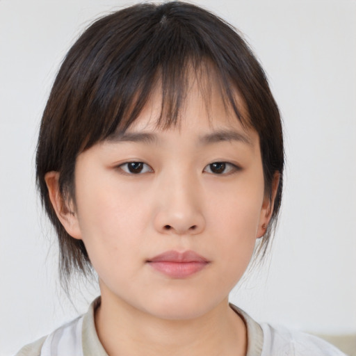 Neutral asian young-adult female with medium  brown hair and brown eyes