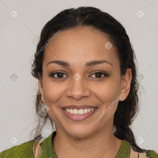 Joyful latino young-adult female with medium  brown hair and brown eyes