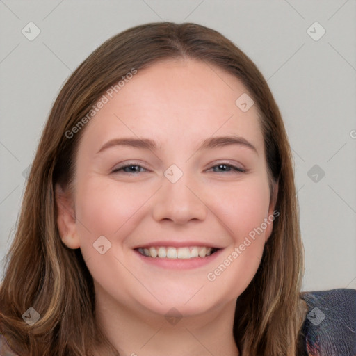 Joyful white young-adult female with long  brown hair and blue eyes