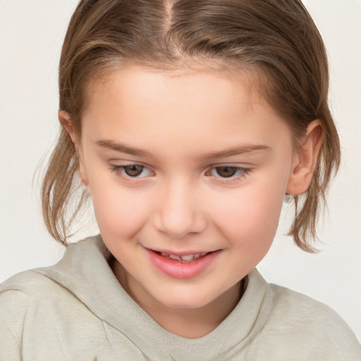 Joyful white child female with medium  brown hair and brown eyes