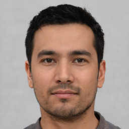 Neutral asian young-adult male with short  black hair and brown eyes