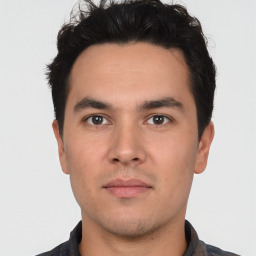 Neutral white young-adult male with short  black hair and brown eyes