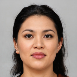 Joyful asian young-adult female with medium  black hair and brown eyes