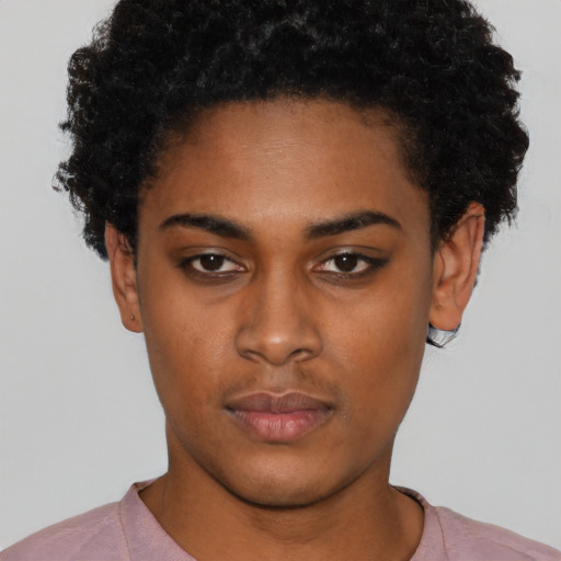 Neutral black young-adult female with short  black hair and brown eyes