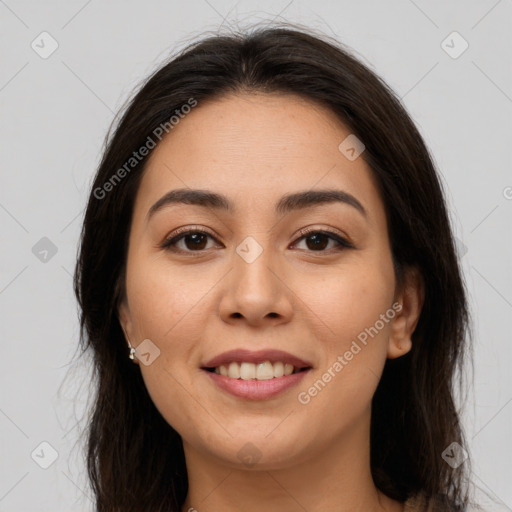 Joyful asian young-adult female with long  brown hair and brown eyes