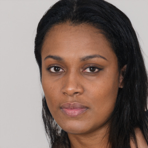 Neutral black young-adult female with long  black hair and brown eyes