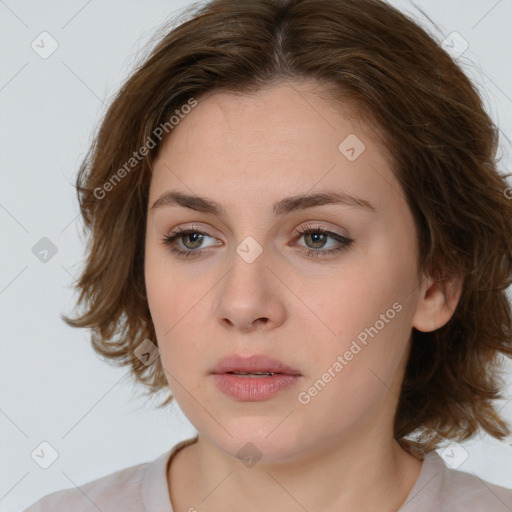 Neutral white young-adult female with medium  brown hair and brown eyes