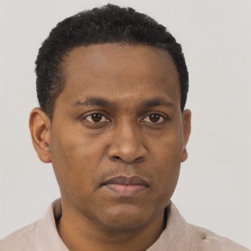 Neutral black young-adult male with short  brown hair and brown eyes