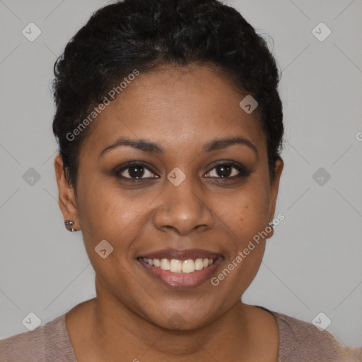 Joyful black young-adult female with short  brown hair and brown eyes