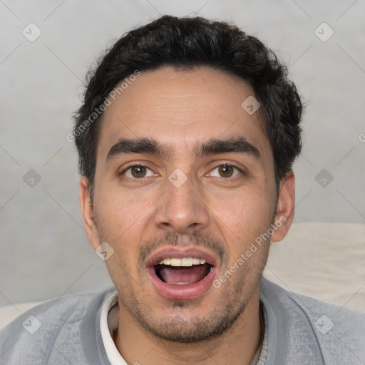 Joyful white young-adult male with short  black hair and brown eyes