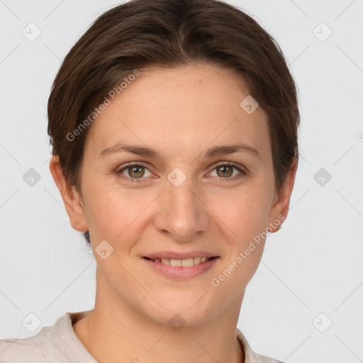 Joyful white young-adult female with short  brown hair and grey eyes