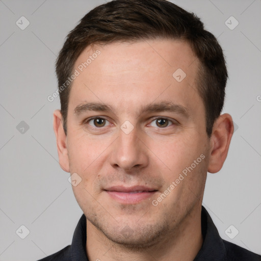 Joyful white young-adult male with short  brown hair and brown eyes