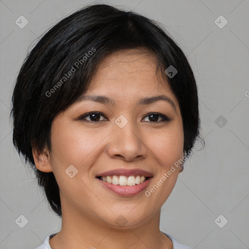 Joyful asian young-adult female with medium  black hair and brown eyes