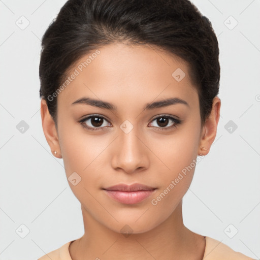 Joyful latino young-adult female with short  brown hair and brown eyes