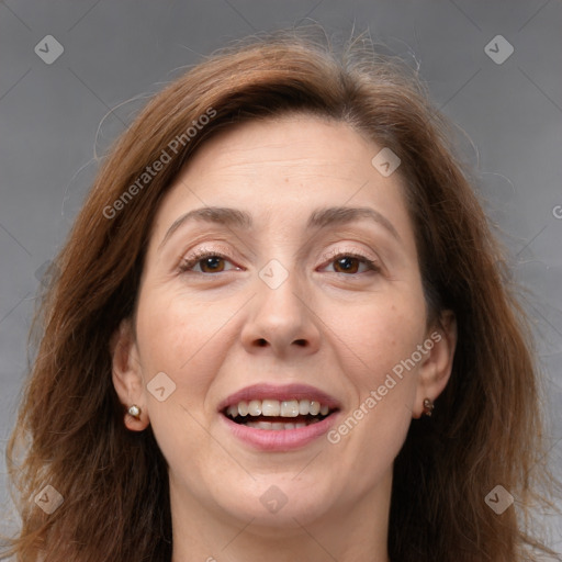 Joyful white adult female with long  brown hair and brown eyes