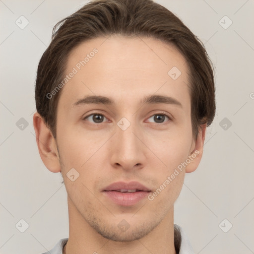 Neutral white young-adult male with short  brown hair and grey eyes