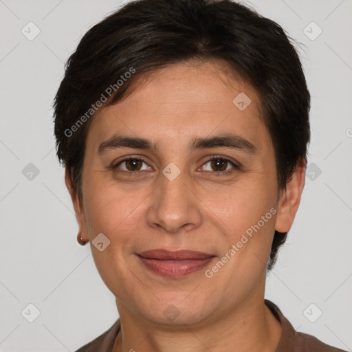 Joyful white adult female with short  brown hair and brown eyes