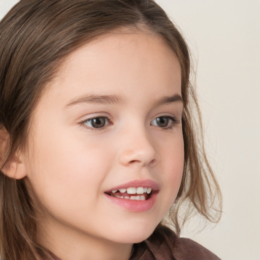 Joyful white child female with long  brown hair and brown eyes