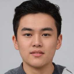 Neutral asian young-adult male with short  brown hair and brown eyes