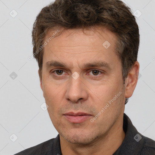 Neutral white adult male with short  brown hair and brown eyes