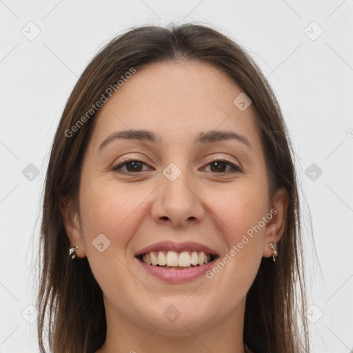 Joyful white young-adult female with long  brown hair and brown eyes