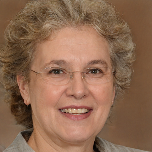 Joyful white middle-aged female with medium  brown hair and brown eyes