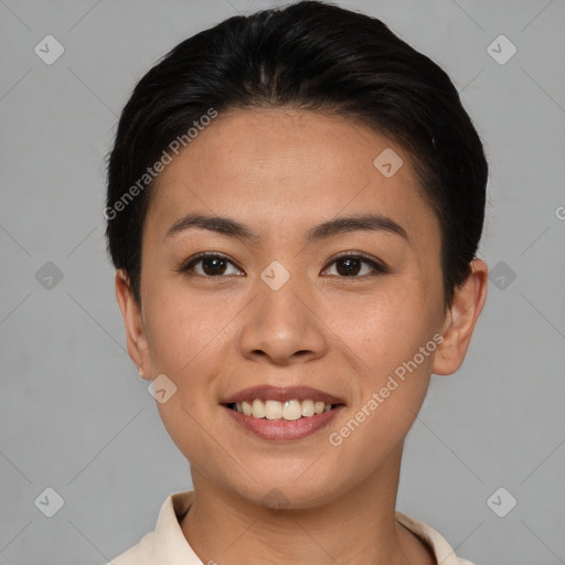 Joyful asian young-adult female with short  brown hair and brown eyes