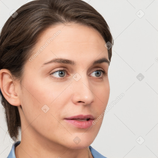 Neutral white young-adult female with medium  brown hair and brown eyes