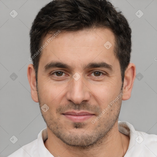 Joyful white young-adult male with short  brown hair and brown eyes