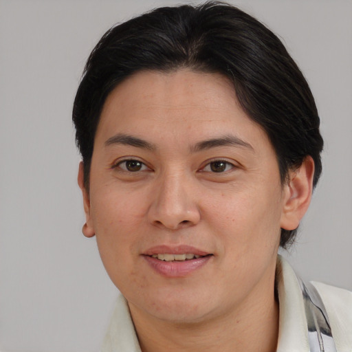 Joyful asian young-adult female with medium  brown hair and brown eyes