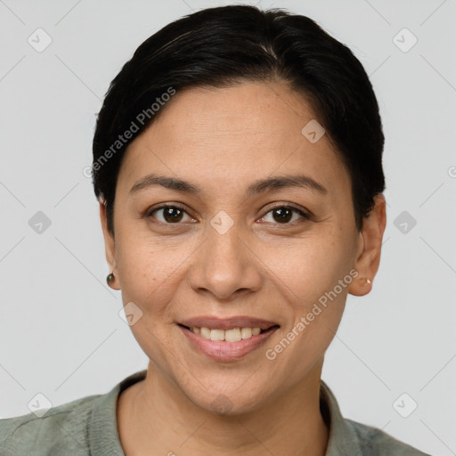 Joyful white adult female with short  brown hair and brown eyes