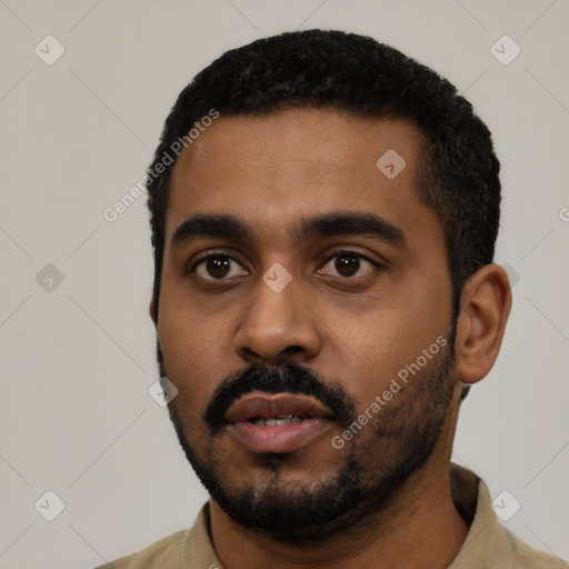 Neutral black young-adult male with short  black hair and brown eyes