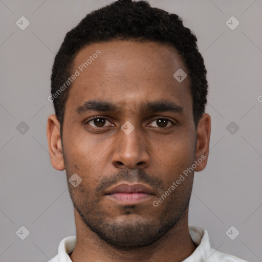Neutral black young-adult male with short  brown hair and brown eyes
